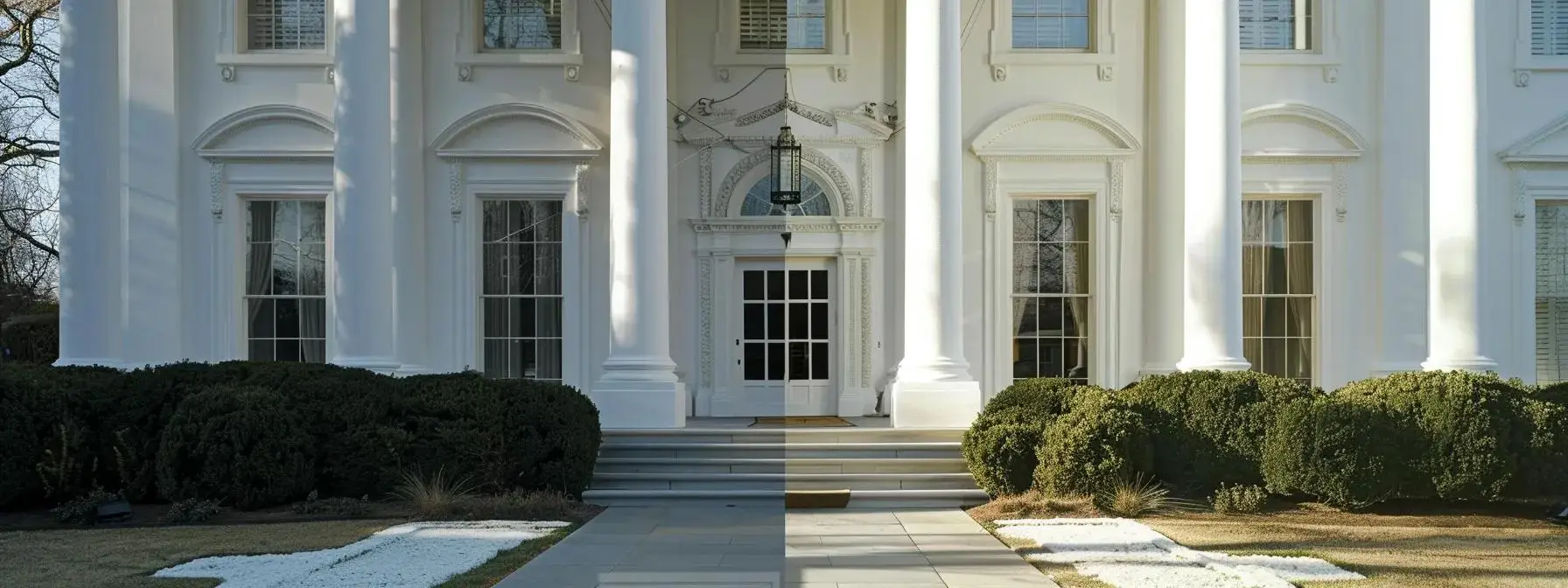 a gleaming white house exterior being power washed, revealing a sparkling clean surface underneath.