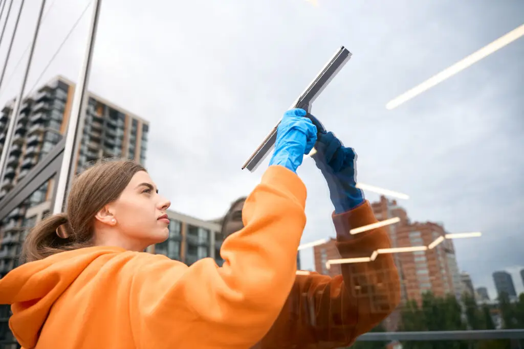 girl team member of alliance window cleaning perth cleaning window