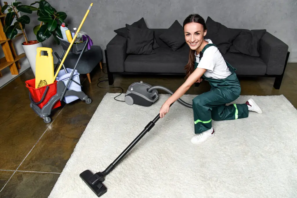 lady carrying out eco friendly carpet cleaning service in Sydney